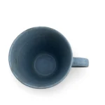 Striscia Oceano ceramic coffee mug with blue ocean-inspired stripes