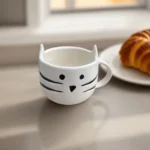 Miao Magico ceramic coffee cup with a playful cat design for cat lovers