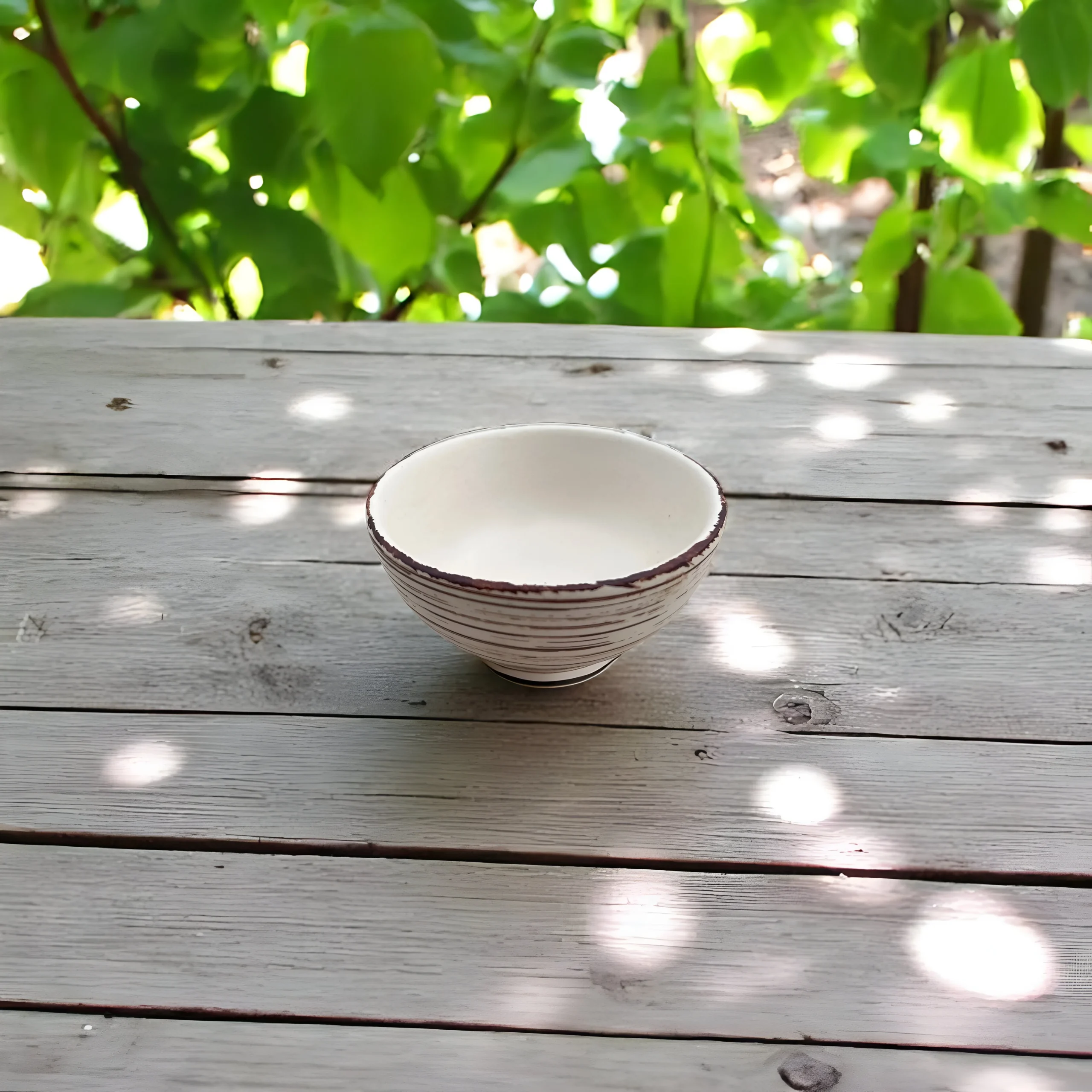 Giro di Fantasia ceramic serving bowl with artistic swirl design, perfect for serving dishes