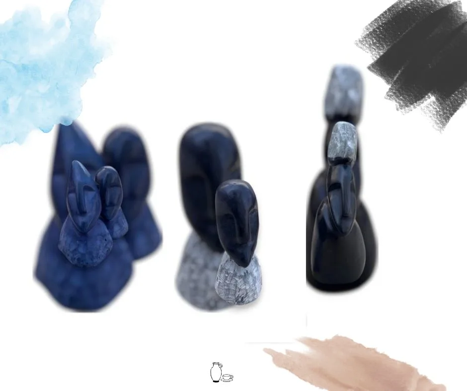 Handcrafted mini sculptures in stone and marble arranged on a wooden shelf for home decor