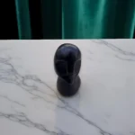 Volti Antichi mini sculpture – earthy-toned ancient stone face sculpture