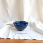 Blu Gal ceramic serving bowl with deep blue ocean-inspired design for serving meals