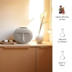 Sfera Anima ceramic vase with spherical design, perfect for displaying flowers in any room