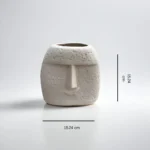 Vaso Sorriso ceramic vase with a whimsical smiley face design, ideal for playful living room décor