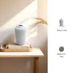Vel Bianco ceramic vase with sleek white design, perfect for floral arrangements in the living room
