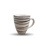 Perfect for astrology enthusiasts, the Zodiaco ceramic mug combines style with functionality. This ceramic coffee mug showcases zodiac-inspired patterns, making it a fun and personalized option for your morning coffee or tea. Add this cute ceramic mug to your collection and let your zodiac sign shine through every sip.